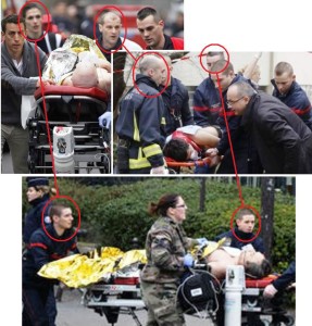 An injured person is evacuated outside the French satirical newspaper Charlie Hebdo's office, in Paris, Wednesday, Jan. 7, 2015. Police official says 11 dead in shooting at the French satirical newspaper. (AP Photo/Thibault Camus)